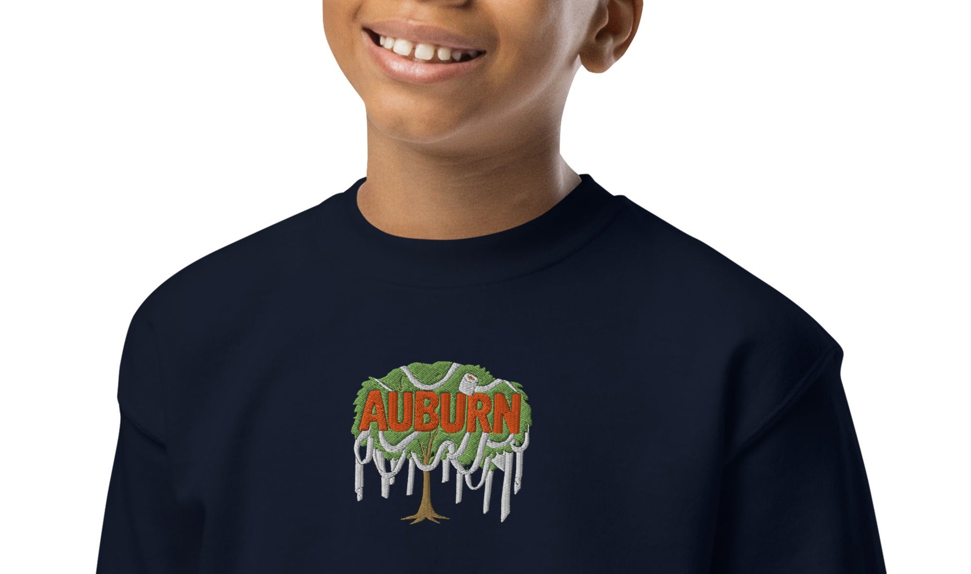 Close up of kids navy Auburn sweatshirt featuring Toomer’s tree graphic, long sleeve crewneck football game day apparel for children